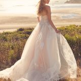 Rebecca-Ingram-Boho-Wedding-Dress-Hattie-Lane Boho Aline wedding dress with plunging neckline and modern lace appliqué with sparkle tulle